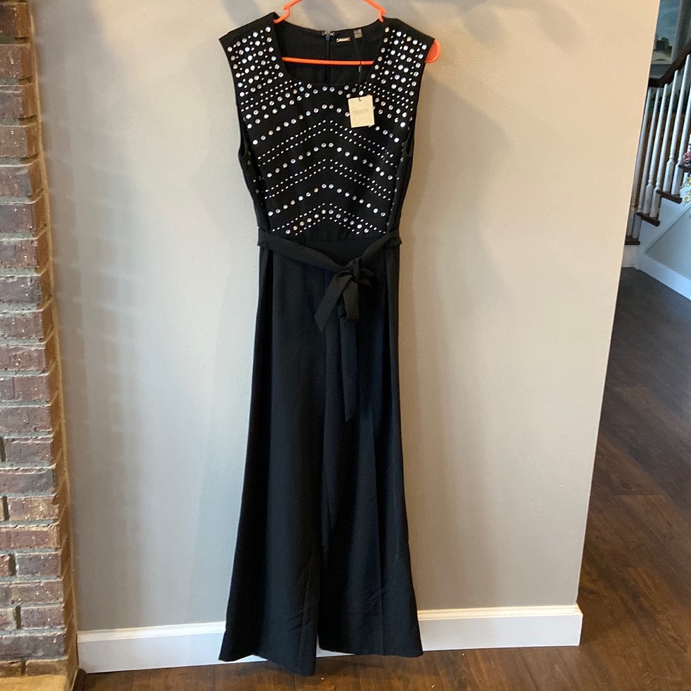 Tahari- one pc- black dressy (onesie)sleeveless-size 12